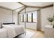 Bright bedroom with hardwood floors, fireplace, and a four-poster canopy bed at 732 S Gaylord St, Denver, CO 80209