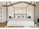 Serene main bedroom showcasing a bed frame, fireplace, and wood beam ceiling at 732 S Gaylord St, Denver, CO 80209