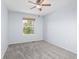 Bedroom featuring new carpet, neutral paint, a ceiling fan and a window with a view at 3931 Shane Valley Trl, Castle Rock, CO 80109