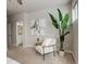 Relaxing bedroom sitting area with comfy chair and large plant at 6727 Canosa St, Denver, CO 80221