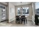 Bright dining area with a table and chairs near the kitchen at 6727 Canosa St, Denver, CO 80221