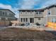 Backyard featuring a patio, a lawn, a grill, and a set of seats at 221 Felicity Loop, Castle Rock, CO 80109