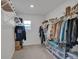 Organized walk-in closet featuring ample shelving and hanging space for efficient storage at 221 Felicity Loop, Castle Rock, CO 80109