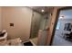 Sleek bathroom with glass shower, modern fixtures and updated vanity area at 442 S Carr St, Lakewood, CO 80226