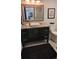 Updated bathroom features a vessel sink, granite countertop, and a modern vanity at 442 S Carr St, Lakewood, CO 80226