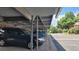Assigned covered carport parking with convenient access to property and visitor parking nearby at 442 S Carr St, Lakewood, CO 80226