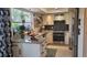 Modern kitchen boasts white cabinetry, granite countertops, and stainless steel appliances at 442 S Carr St, Lakewood, CO 80226