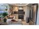 Bright kitchen featuring granite countertops, modern appliances, and stylish black and white tile backsplash at 442 S Carr St, Lakewood, CO 80226