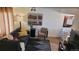 Comfortable living room featuring neutral decor, hardwood floors, and stylish furnishings at 442 S Carr St, Lakewood, CO 80226