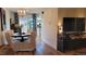 Open-concept living and dining area with sliding glass doors to a private outdoor space at 442 S Carr St, Lakewood, CO 80226