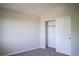 Bedroom features a closet with sliding doors and neutral walls at 640 S Yarrow St, Lakewood, CO 80226