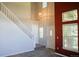 Welcoming entryway featuring new flooring and ample natural light from large windows at 640 S Yarrow St, Lakewood, CO 80226