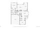 First floor plan showing dimensions of the kitchen, dining room, living room, bathroom, garage, and office at 1533 Bellflower Dr, Brighton, CO 80601