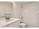 Modern bathroom featuring white subway tile in the shower and a vanity with granite countertop at 10331 E 62Nd Pl, Denver, CO 80238