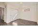 This cozy bedroom has wood-look floors and a closet with sliding doors at 10331 E 62Nd Pl, Denver, CO 80238