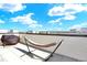 This rooftop deck features a comfortable hammock, perfect for relaxation and enjoying the views at 11205 W 53Rd Ln, Arvada, CO 80002