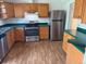 Kitchen featuring stainless steel appliances and ample cabinet space at 938 Salem St, Aurora, CO 80011