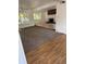 Spacious living room with abundant natural light, and a cozy fireplace at 938 Salem St, Aurora, CO 80011