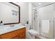 Bathroom featuring a glass-enclosed shower, white vanity and sink at 7071 S Gibraltar Way, Centennial, CO 80016