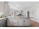 Open kitchen with granite countertops and easy access to other living spaces at 7071 S Gibraltar Way, Centennial, CO 80016