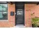 Close up of the front door of this brick home at 4673 Bryant St, Denver, CO 80211