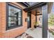 Close up of the brick and front door of this home at 4673 Bryant St, Denver, CO 80211