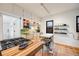 Modern kitchen with stainless steel appliances, light wood cabinets, and decorative shelving at 4673 Bryant St, Denver, CO 80211