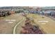 Beautiful aerial view showing nearby Red Rocks Community College and Union Ridge Park trails at 420 Zang St # 108, Lakewood, CO 80228