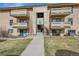 Attractive multi-Gathering building with well-kept lawn, balconies, and convenient access to units at 420 Zang St # 108, Lakewood, CO 80228