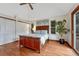Inviting bedroom with hardwood floors, a vaulted ceiling, and a serene atmosphere, perfect for relaxation at 11838 W Arlington Dr, Littleton, CO 80127