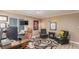Home office space with unique decorations and cozy seating, perfect for work or relaxation at 11256 Lima St, Commerce City, CO 80640