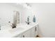 Bright bathroom features double sinks, modern fixtures, and contemporary design at 16423 Mountain Flax Dr, Monument, CO 80132
