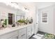 Bright bathroom features a double sink vanity with ample counter space at 16423 Mountain Flax Dr, Monument, CO 80132
