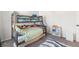 Bedroom features bunk beds, soft lighting, and playful decor at 16423 Mountain Flax Dr, Monument, CO 80132