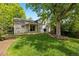 Landscaped backyard and lawn with mature shade trees at 5808 E Hinsdale Pl, Centennial, CO 80112