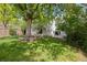 Landscaped backyard with shade trees at 5808 E Hinsdale Pl, Centennial, CO 80112
