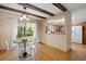 Cozy breakfast nook with backyard view, clear chairs and adjacent kitchen access at 5808 E Hinsdale Pl, Centennial, CO 80112