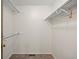 Spacious walk-in closet with shelving providing ample storage space at 5808 E Hinsdale Pl, Centennial, CO 80112