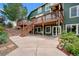 Multi-level deck and patio in a well-maintained yard of a two-story home at 603 E 2Nd Ave, Castle Rock, CO 80108
