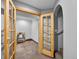 Finished basement area with French doors at 603 E 2Nd Ave, Castle Rock, CO 80108