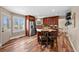 Spacious kitchen featuring custom cabinetry, stainless steel appliances and hardwood floors at 603 E 2Nd Ave, Castle Rock, CO 80108
