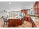 Bright kitchen boasting a large island, stainless steel appliances, and custom cabinetry at 603 E 2Nd Ave, Castle Rock, CO 80108