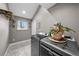 Cozy laundry room with a modern washer/dryer set and natural light at 603 E 2Nd Ave, Castle Rock, CO 80108