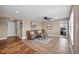 Comfortable living room featuring neutral walls, ceiling fan, and tile floors at 603 E 2Nd Ave, Castle Rock, CO 80108