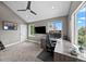 Bright office space with a ceiling fan, modern desk setup, and natural light at 603 E 2Nd Ave, Castle Rock, CO 80108