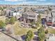 Aerial view of the home's backyard, neighborhood amenities and surrounding homes at 11938 S Meander Way, Parker, CO 80138