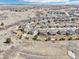 Aerial view of the home in neighborhood with mountain views in the background at 11938 S Meander Way, Parker, CO 80138