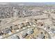 Aerial view of the home in neighborhood with mountain views in the background at 11938 S Meander Way, Parker, CO 80138