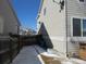 Backyard view highlighting the home's exterior, fence, and potential for outdoor living at 3930 S Quatar St, Aurora, CO 80018