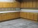 Garage featuring ample cabinetry for organized storage solutions at 3930 S Quatar St, Aurora, CO 80018